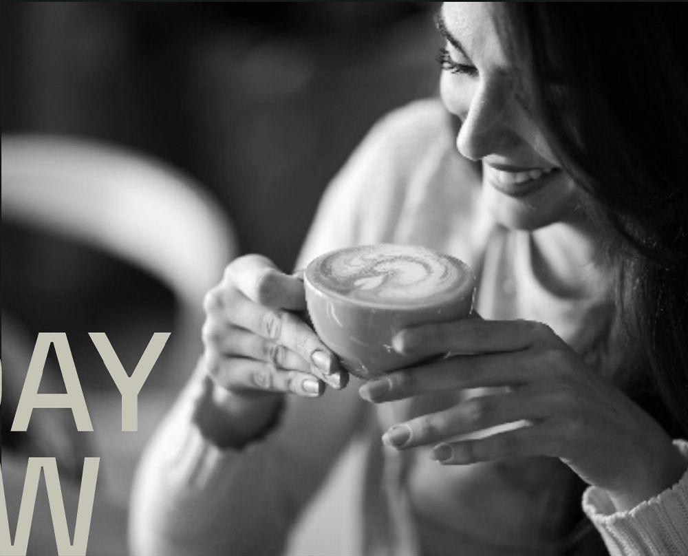 Woman enjoying a latte